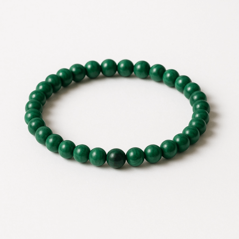 Malachit-Armband aus glatten, tiefgrünen Perlen, kreisförmig aufgelegt